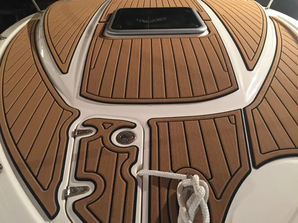  Custom SeaDek flooring with a teak-look finish for a timeless appeal.